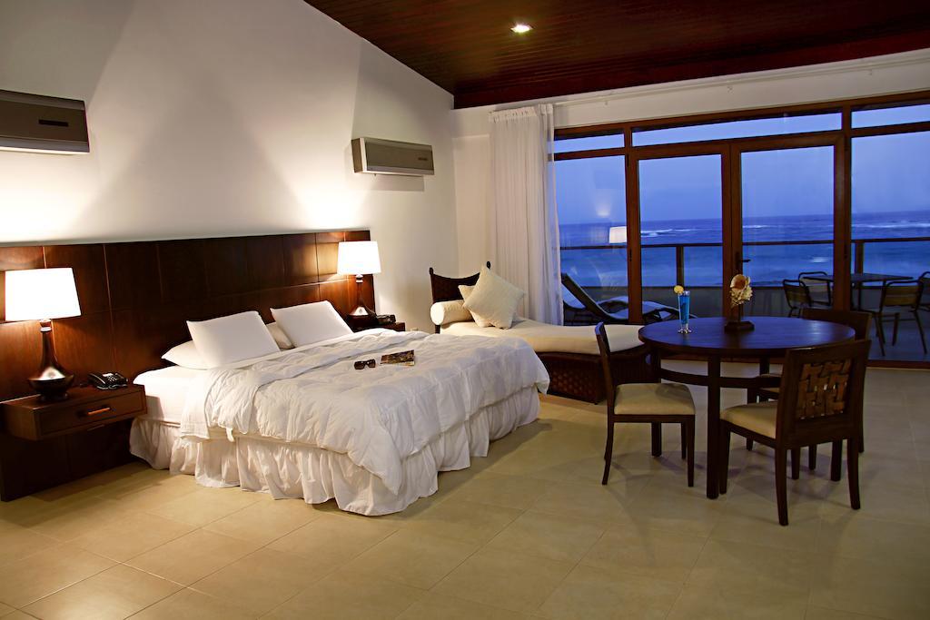 Iguana Crossing Boutique Hotel Puerto Villamil Kamer foto