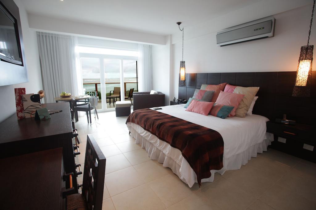 Iguana Crossing Boutique Hotel Puerto Villamil Kamer foto