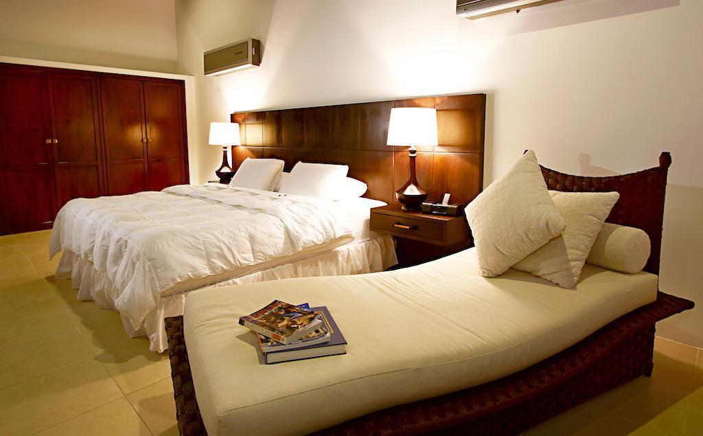 Iguana Crossing Boutique Hotel Puerto Villamil Kamer foto